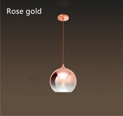 One pendant glass ball luminaire suspension E27 lights with rose gold finish.
