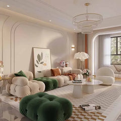 “Art-style modern living room with green and beige sofa and decorative accents”