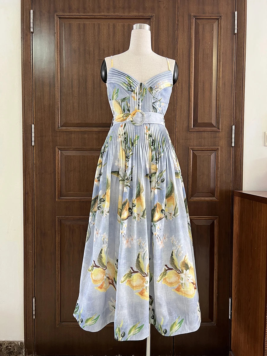 Dress with cotton blend lemon dress, perfect for Mediterranean summer styling on a mannequin against a wooden door.
