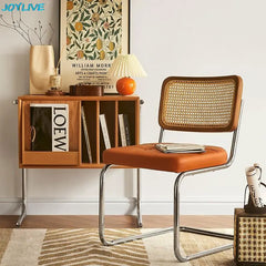 Golden Atelier living room chairs made from solid wood with a modern rattan design and comfortable armrests. Orange 2