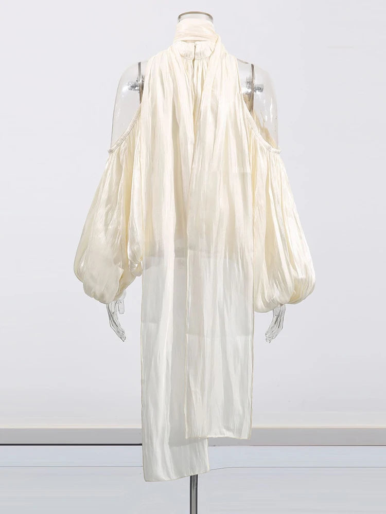 White dress on a mannequin against a white background