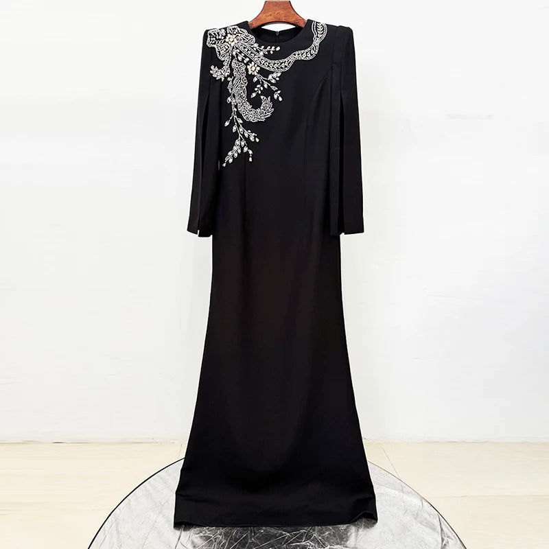 Black slit sleeve beaded O-neck maxi dress on hanger