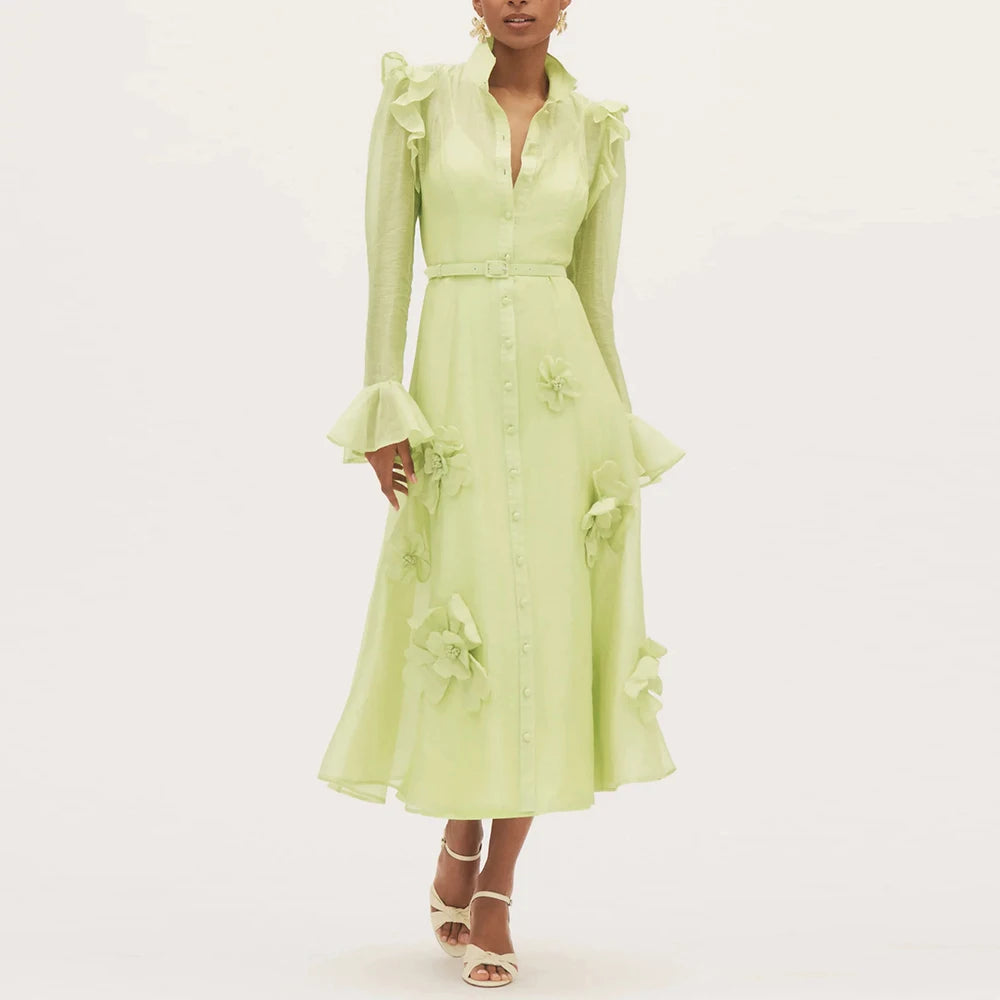 Light green dress with ruffled sleeves and waistband 
