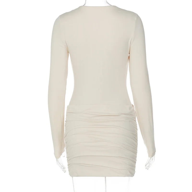 Beige long-sleeve dress on a white background