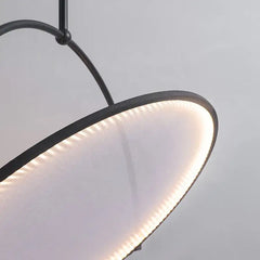 Close-up of a minimalist LED pendant light showcasing its clean lines and elegant design.