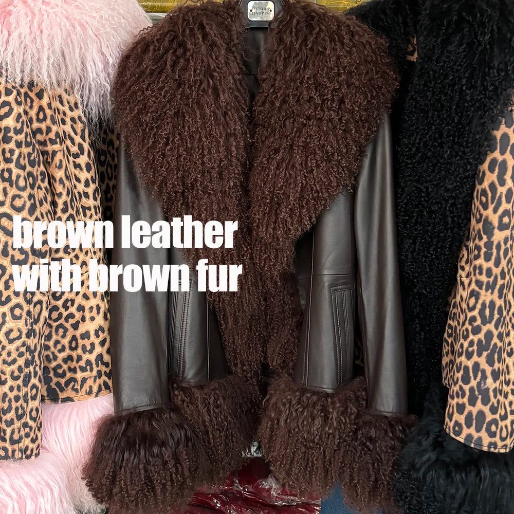 Brown leather jacket with brown fur trim on a rack.