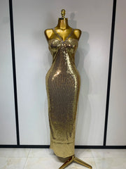 Gold glitter sequin column maxi dress with spaghetti straps.