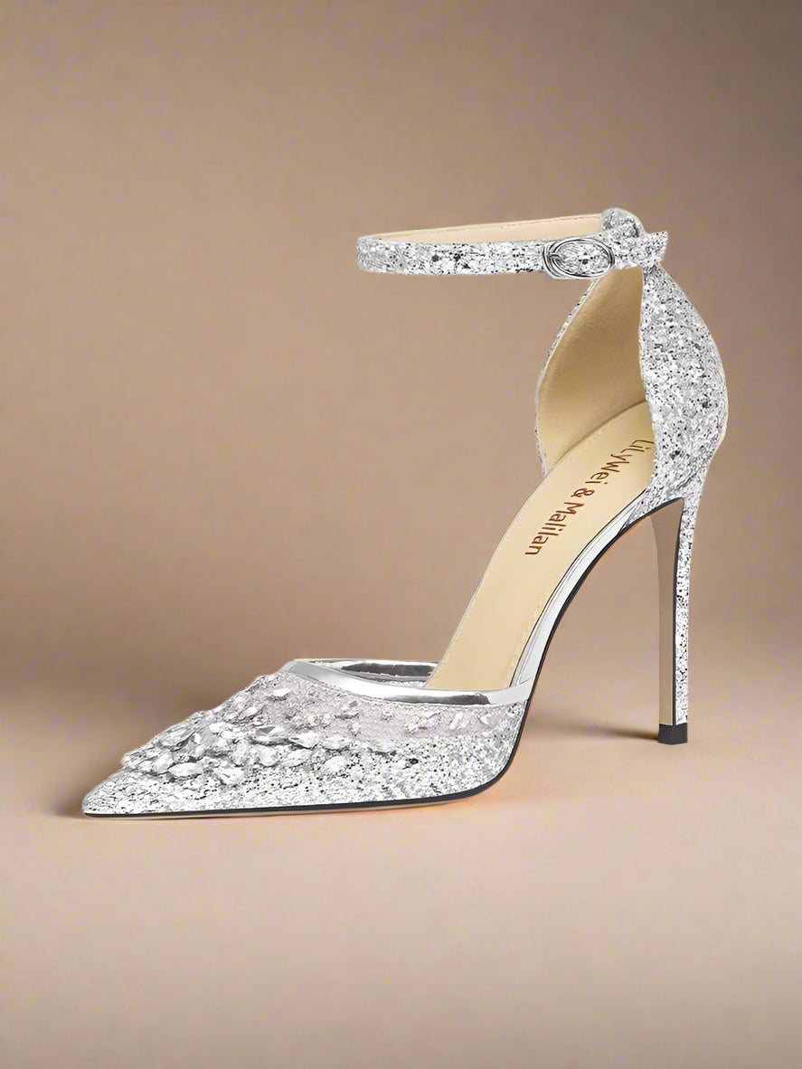 Silver glitter high-heeled shoe with 'LILY WEI' branding on a light gray background