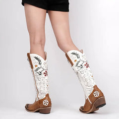 Side view of knee-high embroidered western boots