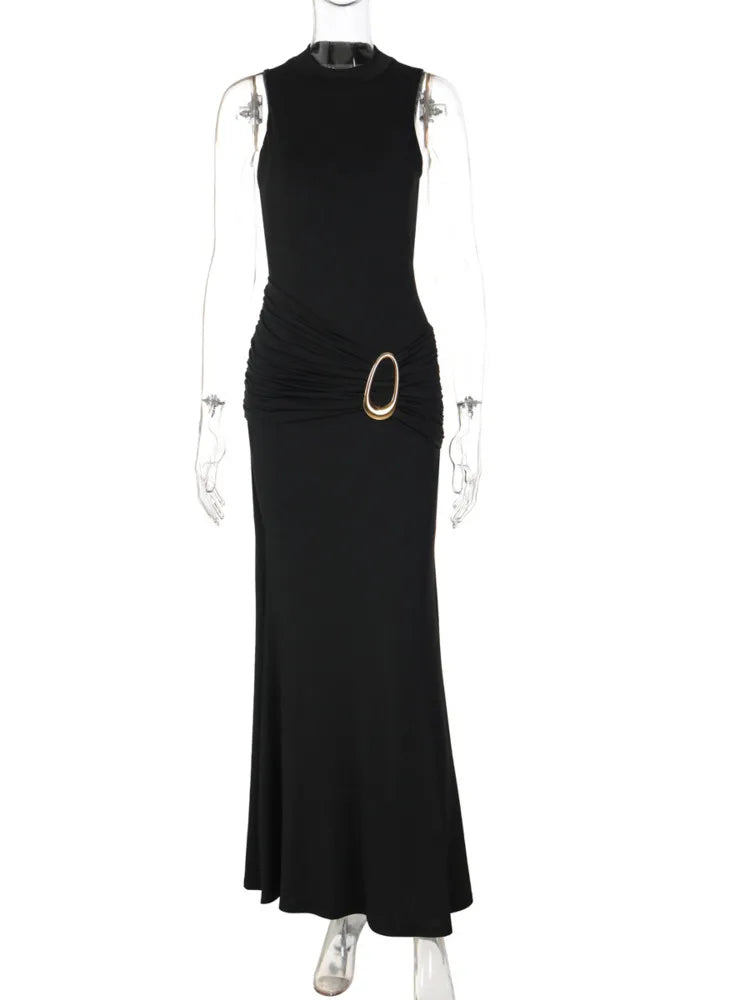 Black dress with a gold belt on a mannequin against a white background
