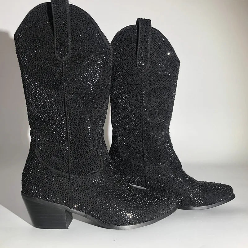 Close-up of embellished western boots highlighting the intricate rhinestone pattern.