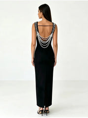 Black sleeveless maxi dress with pearl chain back detail