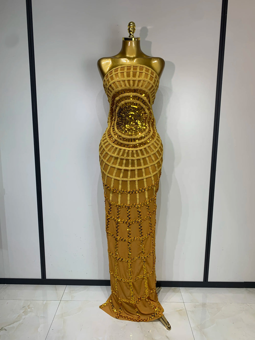Strapless sheer mesh sequin embellished column maxi dress in gold.