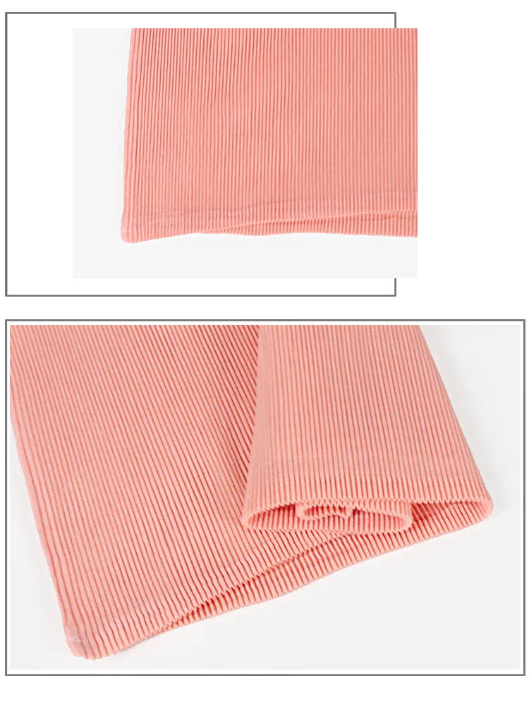 Pink ribbed fabric on a white background