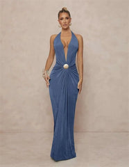 Blue formal gown with a plunging halter neckline and draped waist.