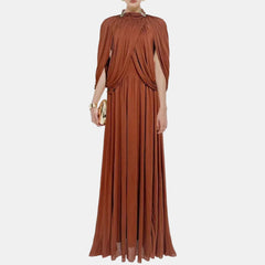 Woman wearing a brown dress with a white background