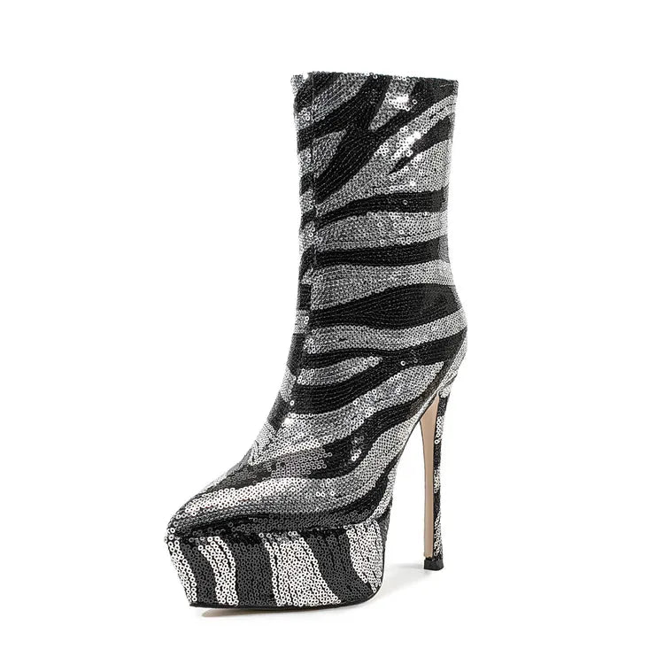 Black and silver zebra-striped high-heeled boot on a white background