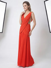 Woman wearing a red evening gown on a white background