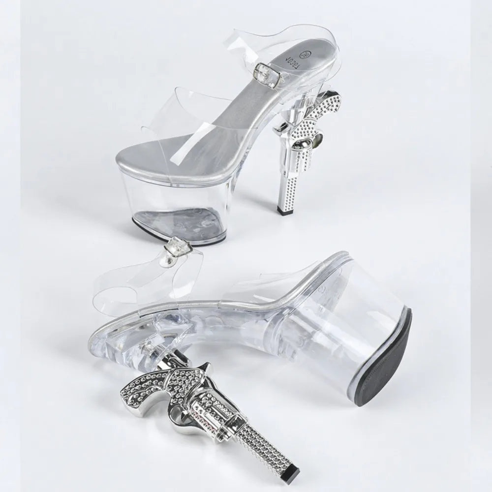 Clear high-heeled shoes with decorative elements on a white background