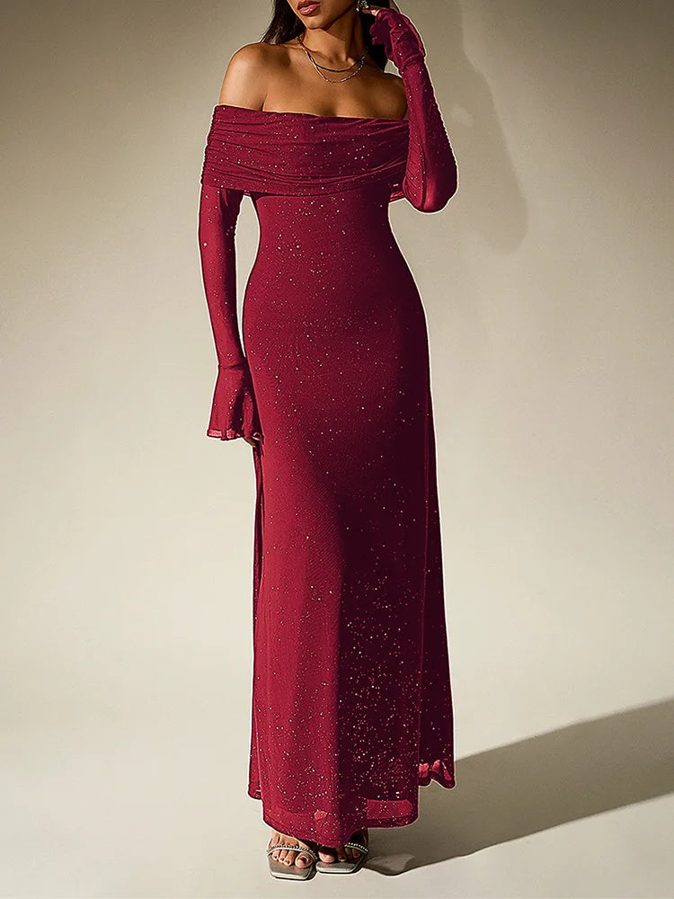 Red off-shoulder evening gown on a plain background