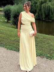 One-shoulder cutout ruched maxi dress on a woman outdoors.