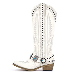 White cowboy boot with decorative studs and a buckle on a white background