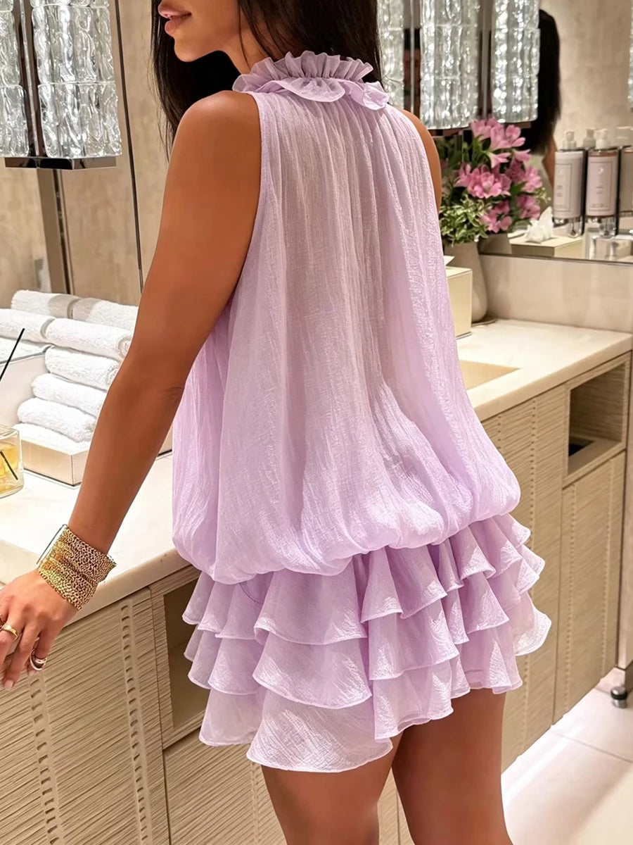 Back view of purple ruffled floral embellished mini dress