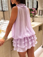 Back view of purple ruffled floral embellished mini dress