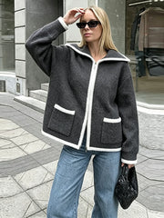 Model wearing gray textured zip-front collar coat