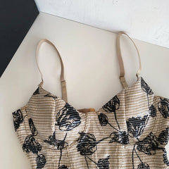 Close-up of floral print corset top neckline