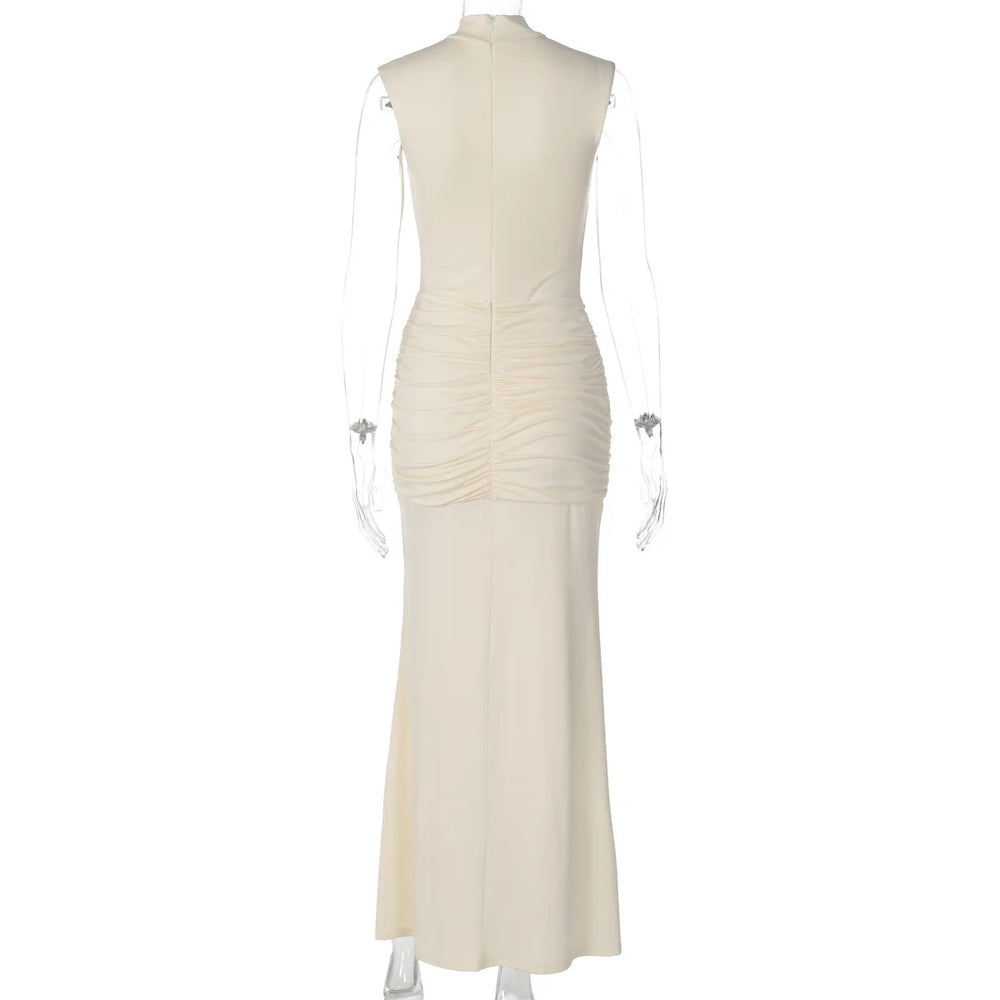 White evening gown on a mannequin against a white background