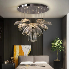 A striking modern gold LED chandelier hanging in a spacious Bed room, creating a focal point .Golden Atelier 2