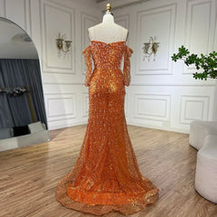 Orange sequin evening gown on a mannequin against a white wall.