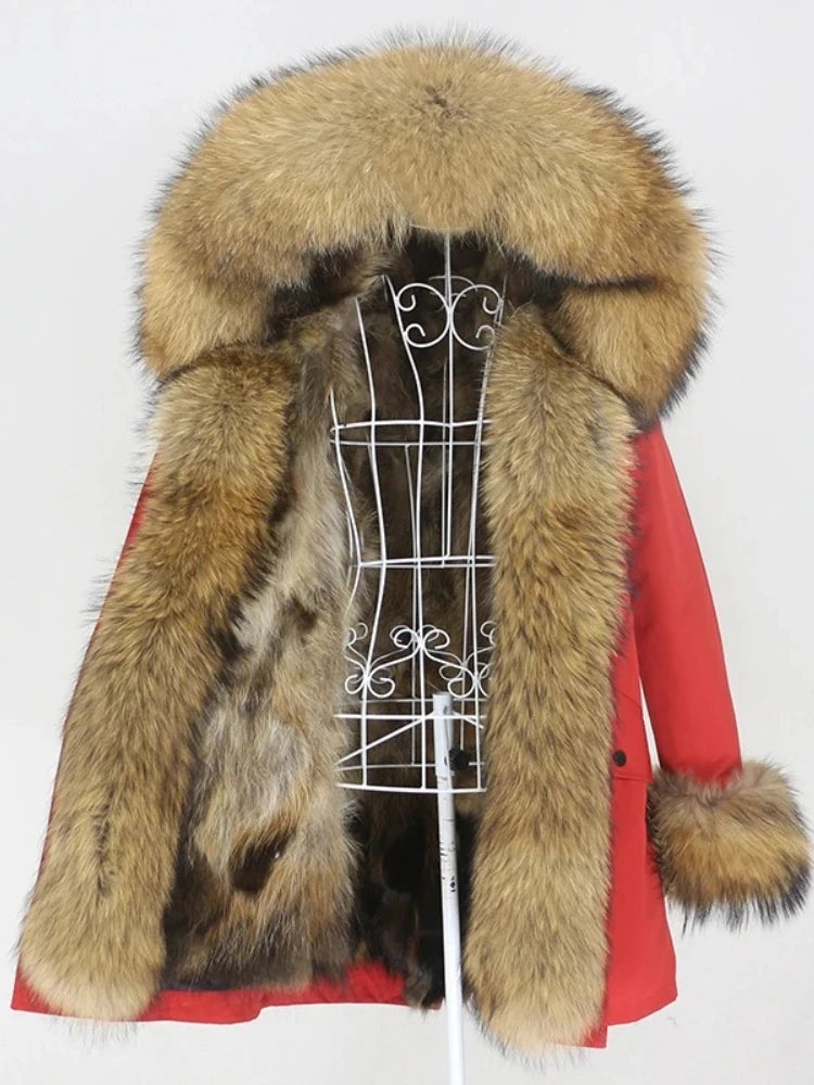 Red coat with fur trim on a mannequin against a white background