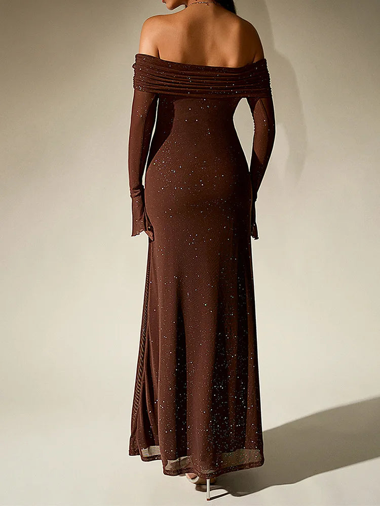 Brown off-shoulder evening gown with long sleeves on a neutral background