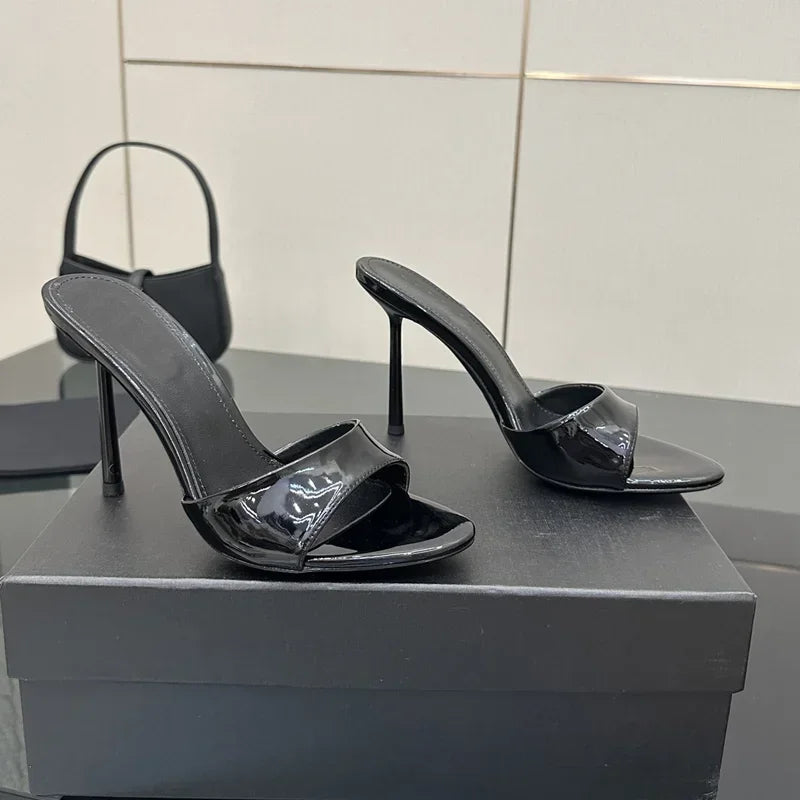 Black patent pointed toe stiletto heels