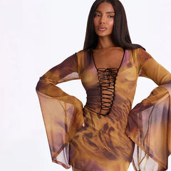 Back view of a leopard print mini dress with flare sleeves