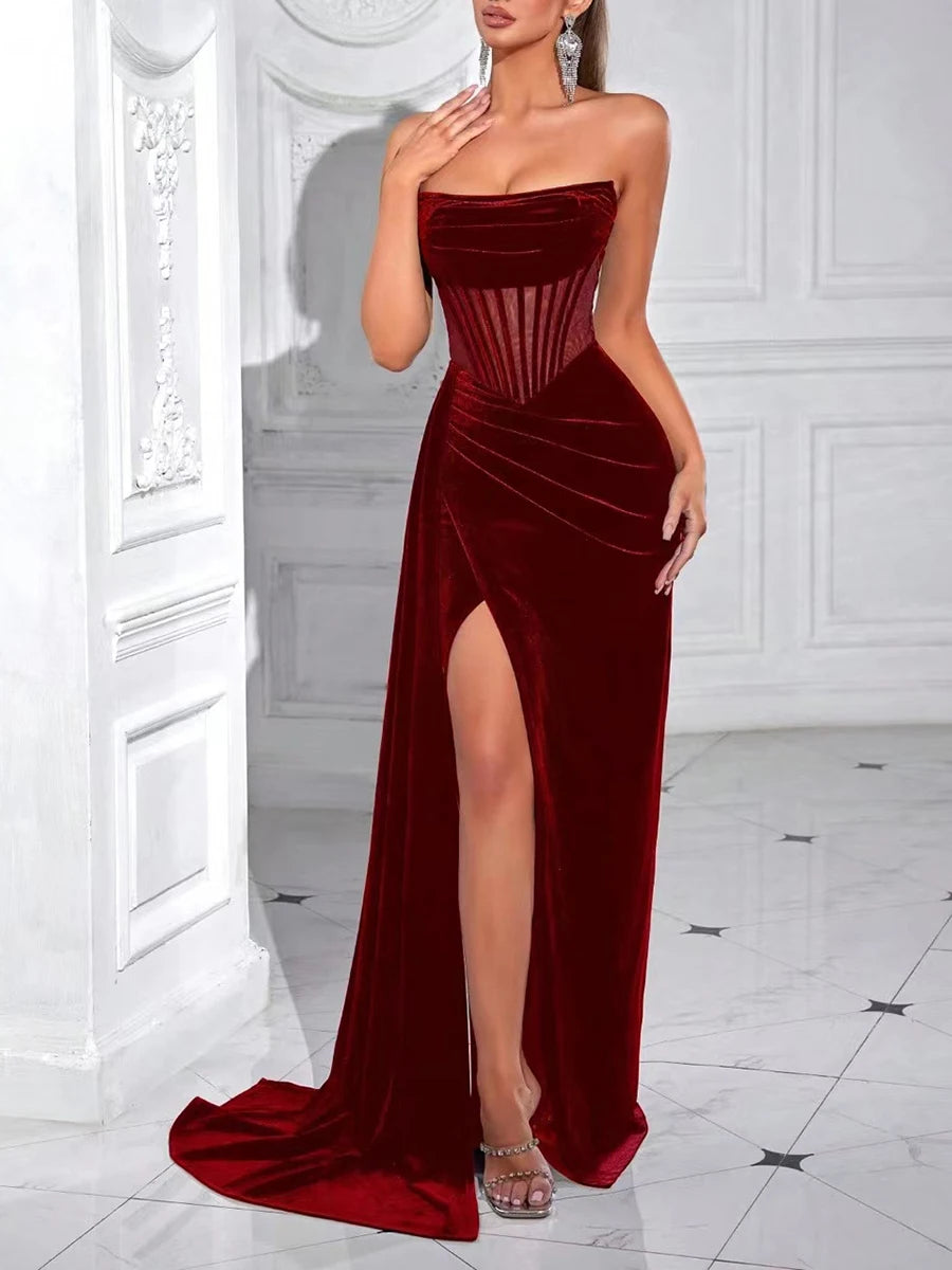 Elegant evening dress featuring a high slit and sculpted silhouette
