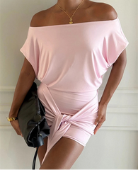 Off-the-shoulder draped mini dress with asymmetric knot detail