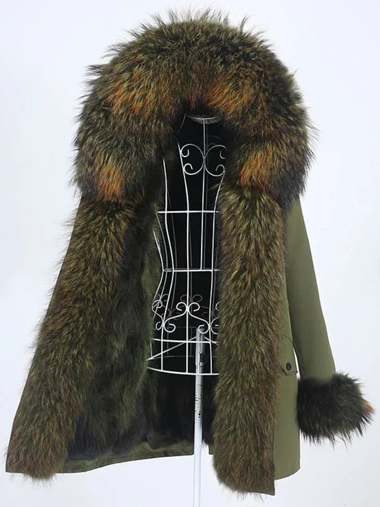 Green coat with a fur collar on a mannequin against a white background