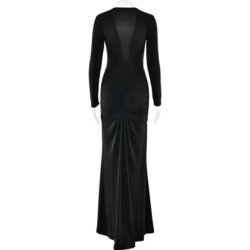 Black evening gown with long sleeves on a white background
