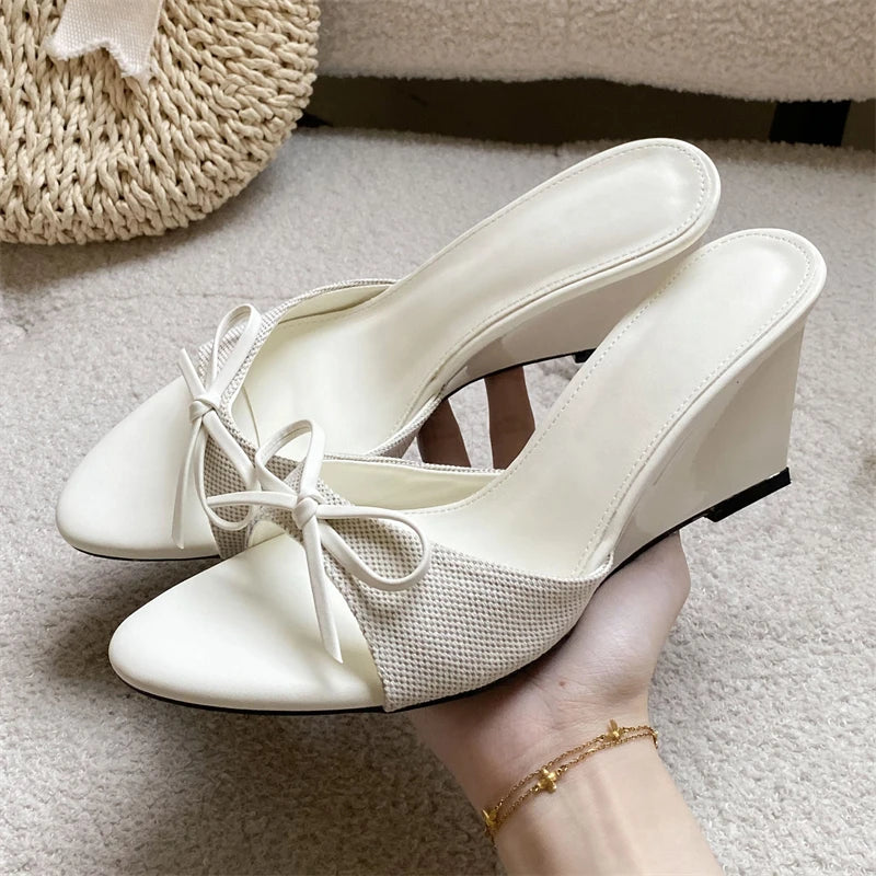 White bow wedge mules