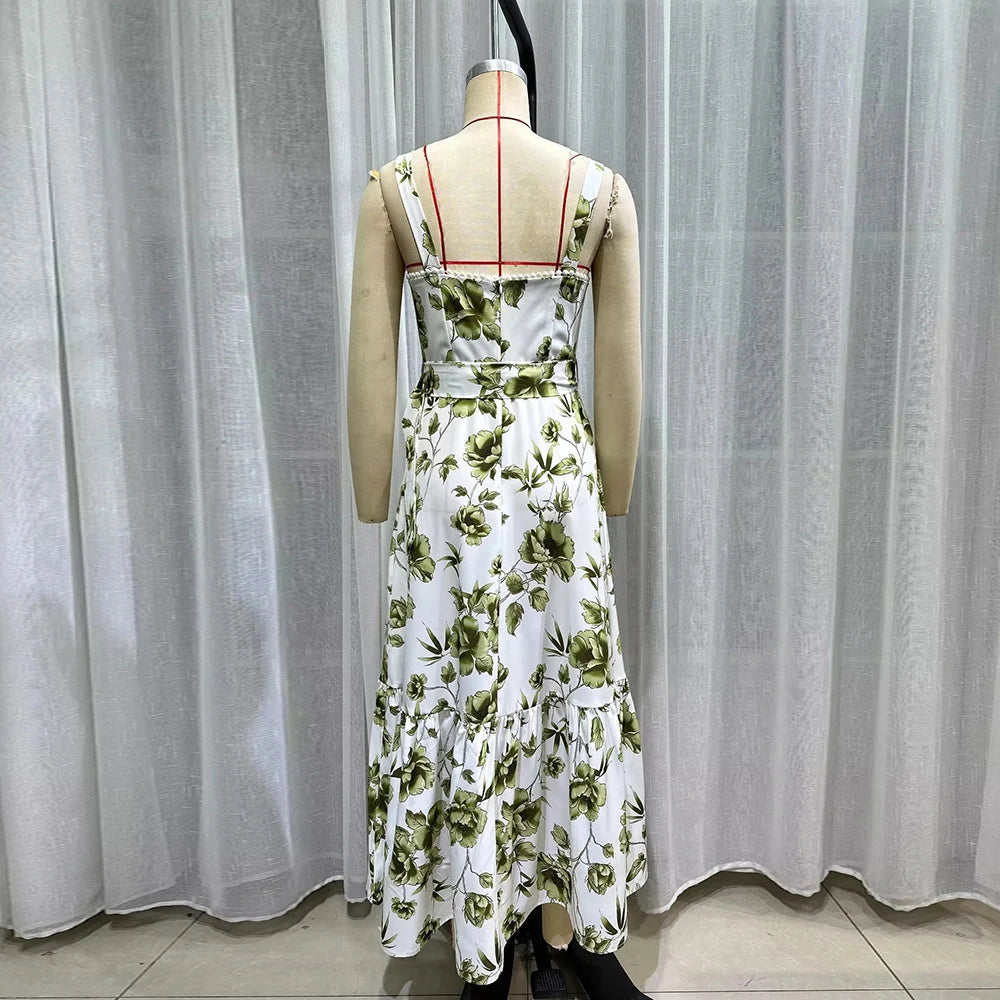 Floral dress on a mannequin against a white curtain background