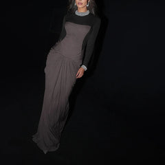 Sculpted panel evening dress shown with gathered waist drape.