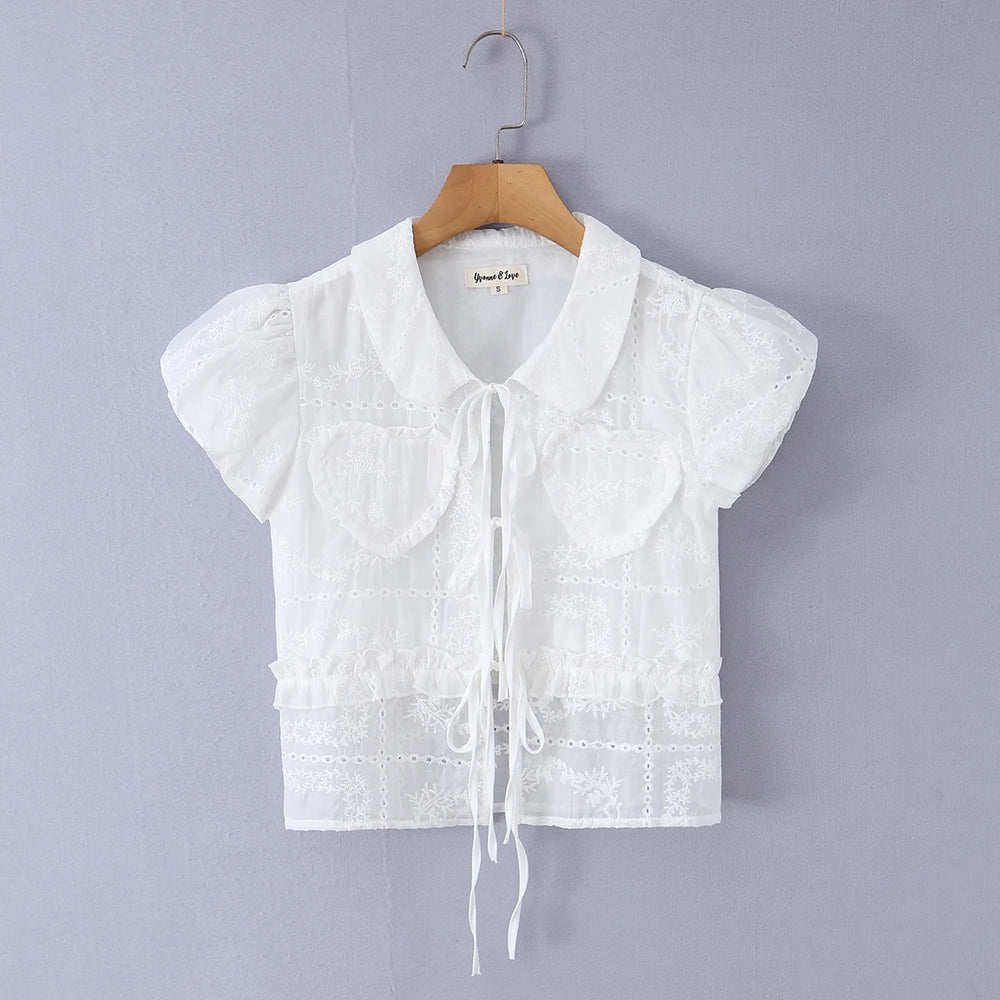 White embroidered puff sleeve crop top with tie front