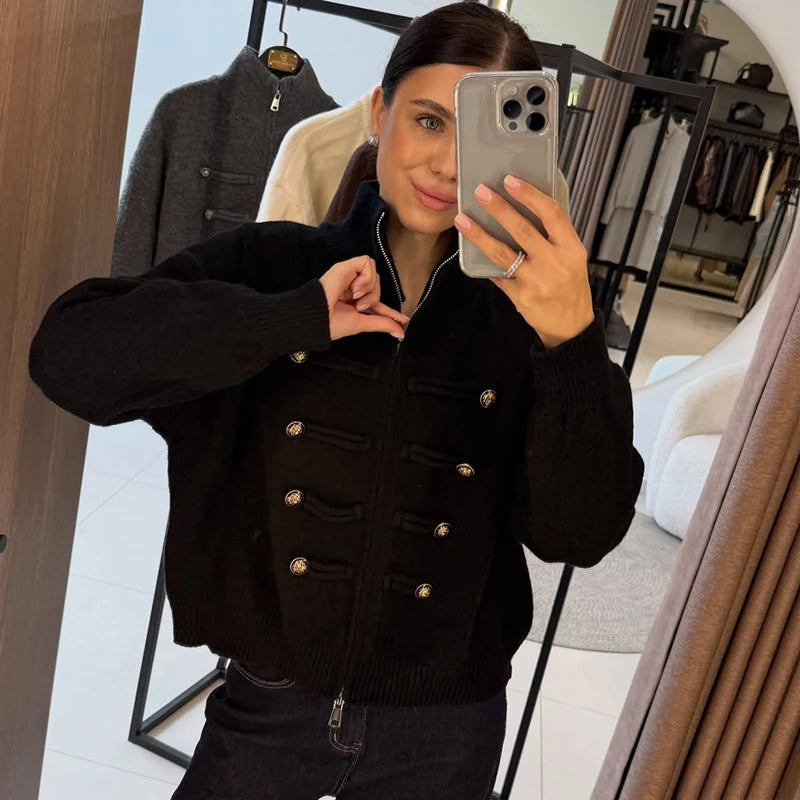 Black knit jacket with stand collar and double-breasted button detail
