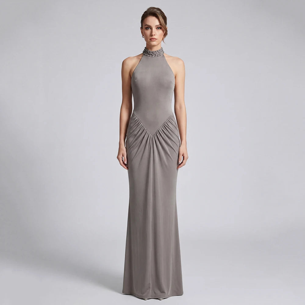 Diamond embellished halter neck ruched floor length gown