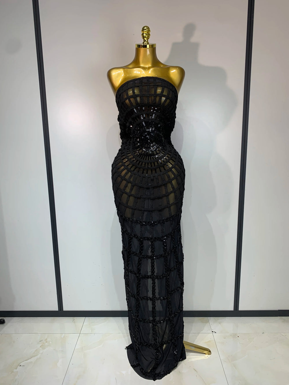 Strapless sheer mesh sequin embellished column maxi dress in black.