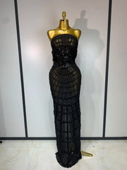 Strapless sheer mesh sequin embellished column maxi dress in black.