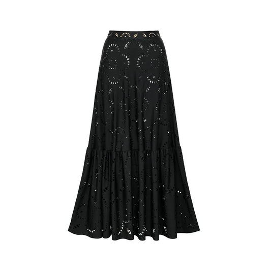 Black tiered maxi skirt with laser-cut floral pattern